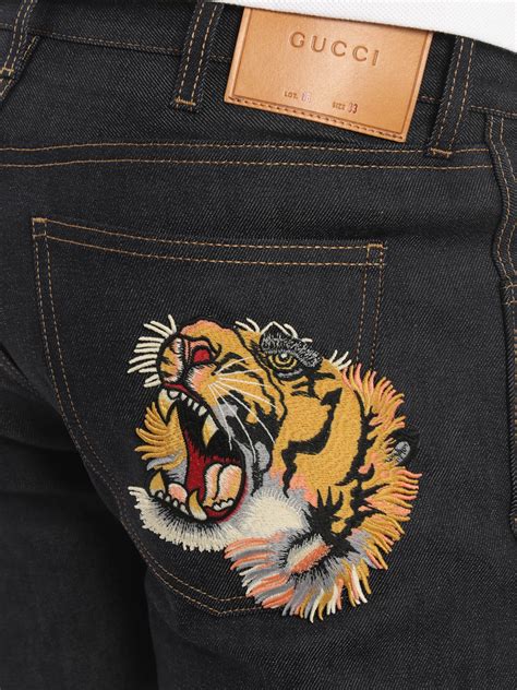 jeans gucci donna tigre|gucci tiger jewelry.